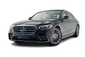 Luxury black sedan parked, ready for chauffeur service, stylish and comfortable vehicle for transportation.