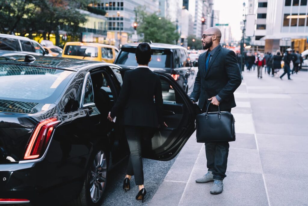 Successful Business Partners Getting In Car At Cit 2024 05 28 17 44 19 Utc 1 1024x683